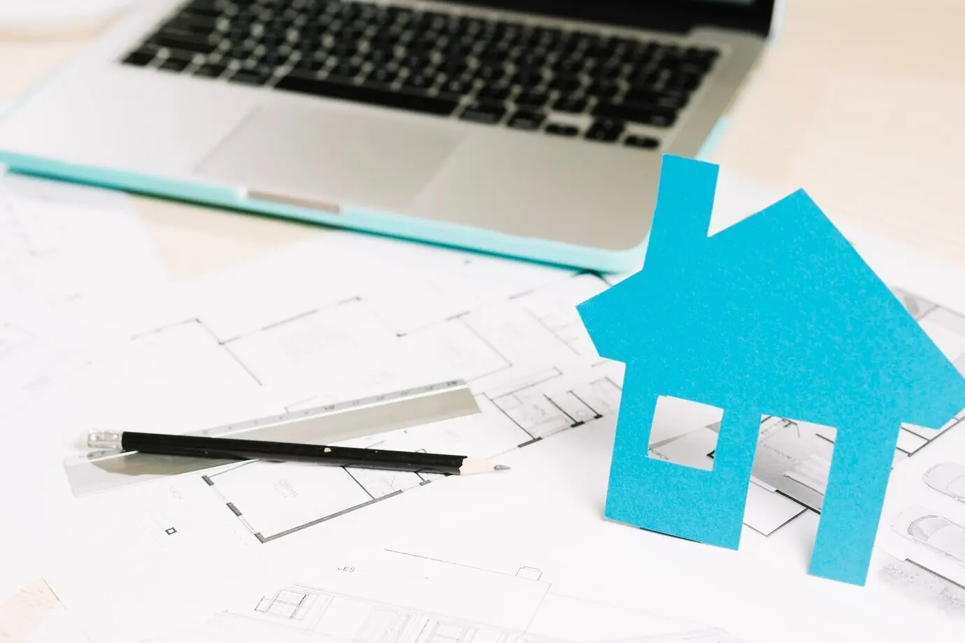 A small figurine and a blueprint